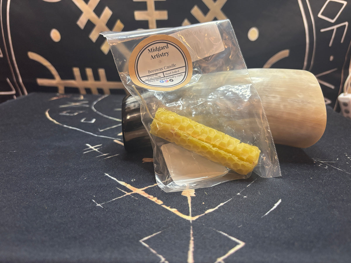 Small hand-rolled beeswax candles by Patience at Midgard Artistry