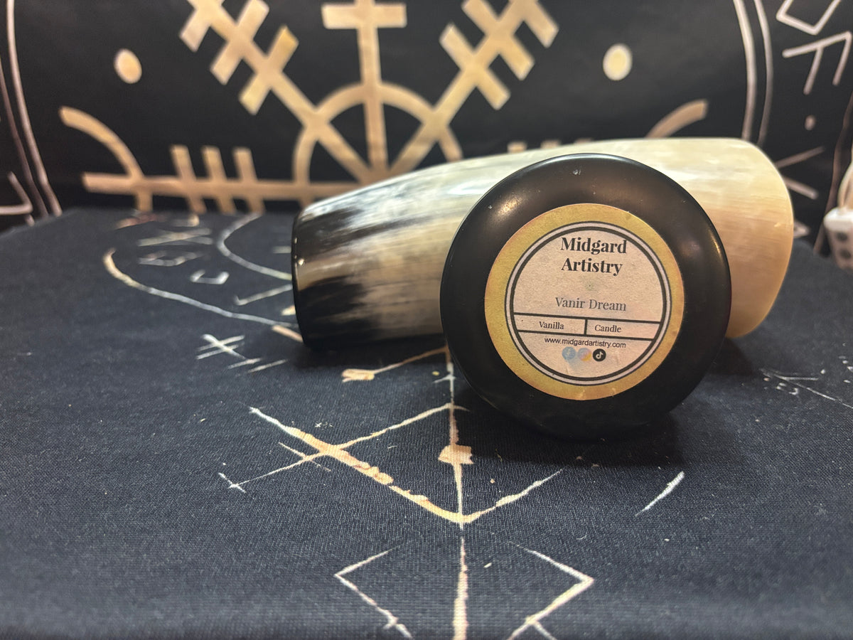 Homemade candles in 2.5 inch tins by Midgard Artistry